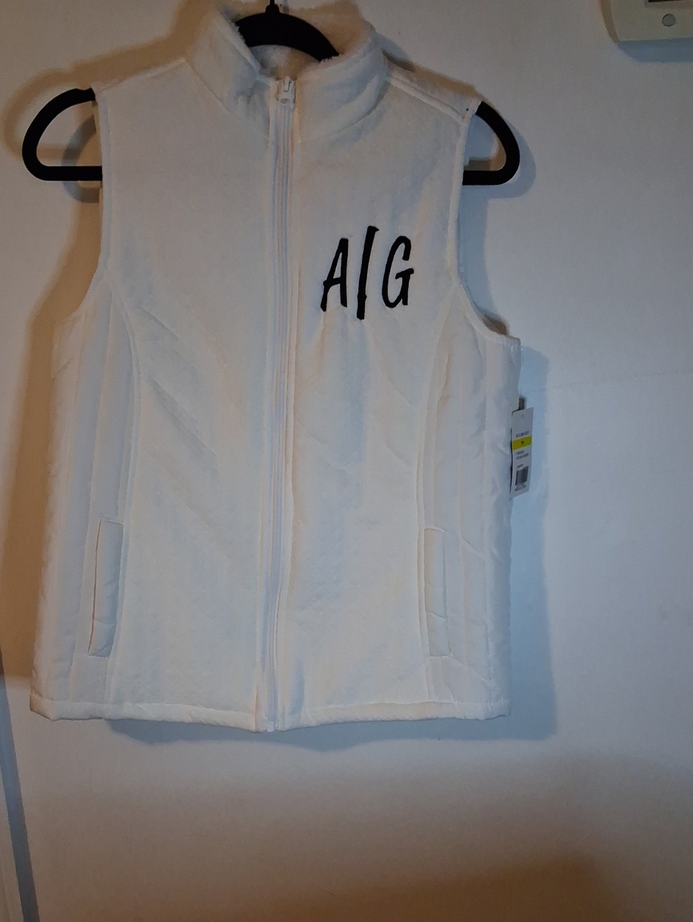 Kim Rogers White Fleece Vest with Black Chest Logo
